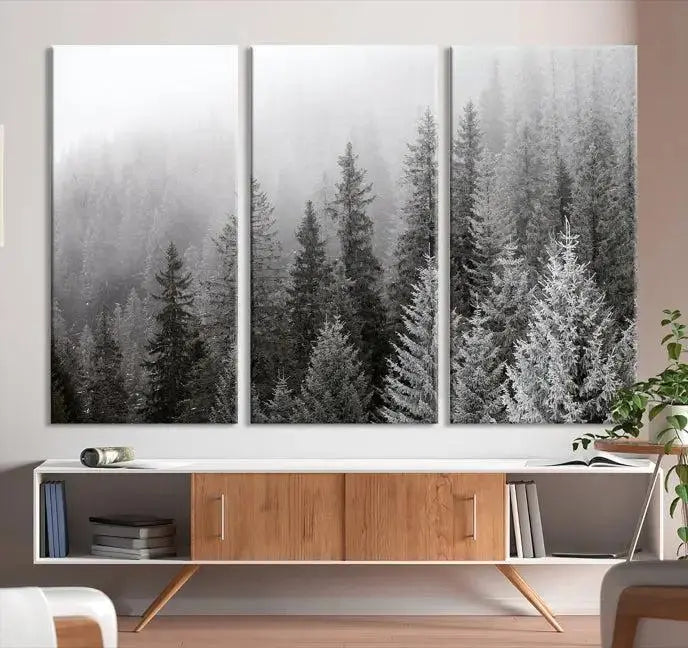 The living room's wall is adorned with the "Big Foggy Forest and Misty Trees Forest Wall Art Canvas Print," which adds an elegant touch to the space.