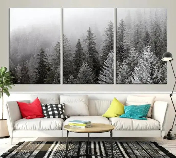 The living room's wall is adorned with the "Big Foggy Forest and Misty Trees Forest Wall Art Canvas Print," which adds an elegant touch to the space.