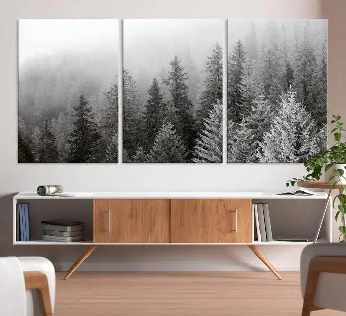 The living room's wall is adorned with the "Big Foggy Forest and Misty Trees Forest Wall Art Canvas Print," which adds an elegant touch to the space.