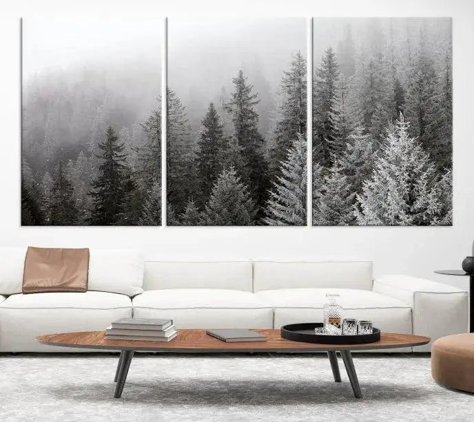 The living room's wall is adorned with the "Big Foggy Forest and Misty Trees Forest Wall Art Canvas Print," which adds an elegant touch to the space.