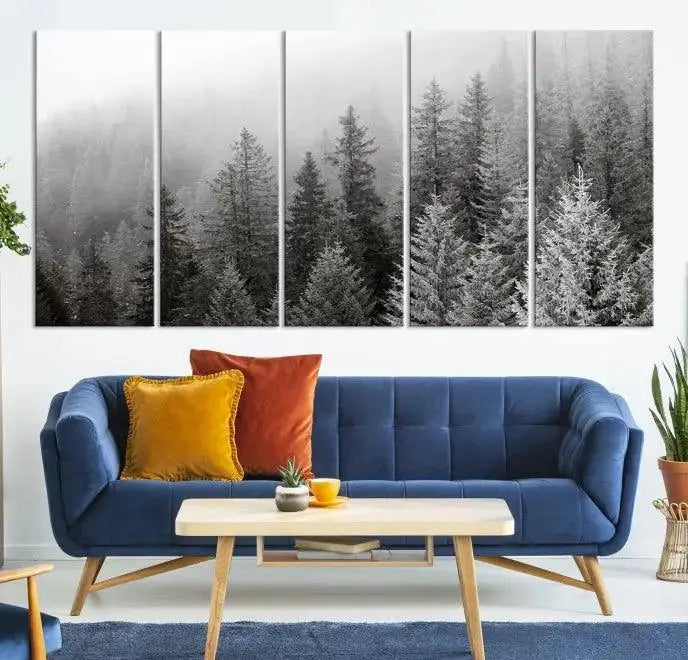 The living room's wall is adorned with the "Big Foggy Forest and Misty Trees Forest Wall Art Canvas Print," which adds an elegant touch to the space.