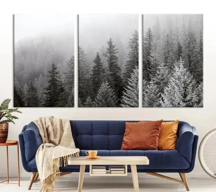 The living room's wall is adorned with the "Big Foggy Forest and Misty Trees Forest Wall Art Canvas Print," which adds an elegant touch to the space.