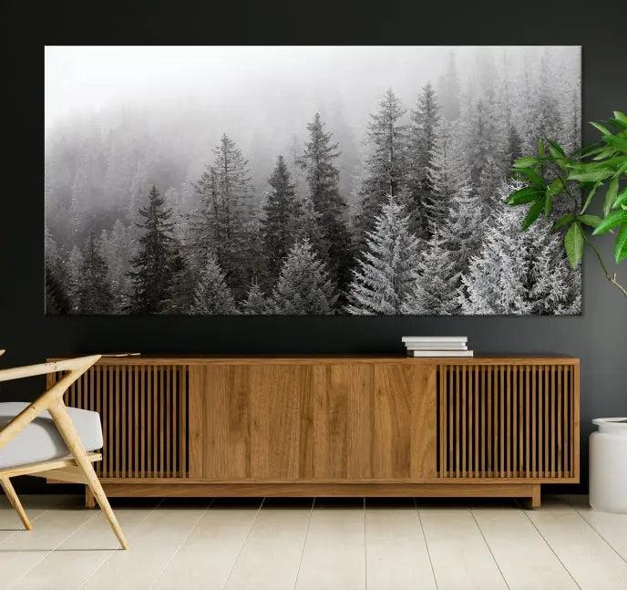 The living room's wall is adorned with the "Big Foggy Forest and Misty Trees Forest Wall Art Canvas Print," which adds an elegant touch to the space.