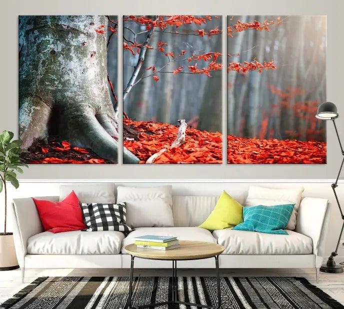 The "Big Tree and Forest Red Leave Wall Art Canvas Print" adorns the wall, featuring a striking triptych of a forest scene with a large tree trunk and vibrant red leaves. This artwork is printed on museum-quality Polycotton canvas and comes ready to hang, offering both elegance and durability.