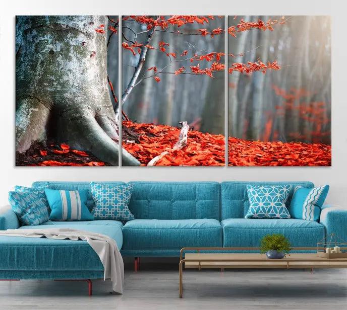 The "Big Tree and Forest Red Leave Wall Art Canvas Print" adorns the wall, featuring a striking triptych of a forest scene with a large tree trunk and vibrant red leaves. This artwork is printed on museum-quality Polycotton canvas and comes ready to hang, offering both elegance and durability.