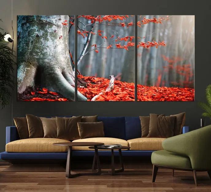 The "Big Tree and Forest Red Leave Wall Art Canvas Print" adorns the wall, featuring a striking triptych of a forest scene with a large tree trunk and vibrant red leaves. This artwork is printed on museum-quality Polycotton canvas and comes ready to hang, offering both elegance and durability.