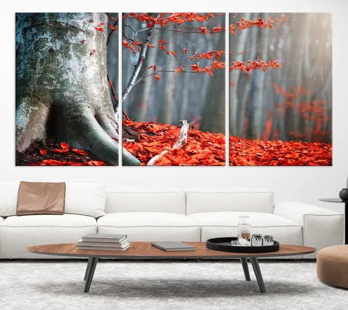 The "Big Tree and Forest Red Leave Wall Art Canvas Print" adorns the wall, featuring a striking triptych of a forest scene with a large tree trunk and vibrant red leaves. This artwork is printed on museum-quality Polycotton canvas and comes ready to hang, offering both elegance and durability.