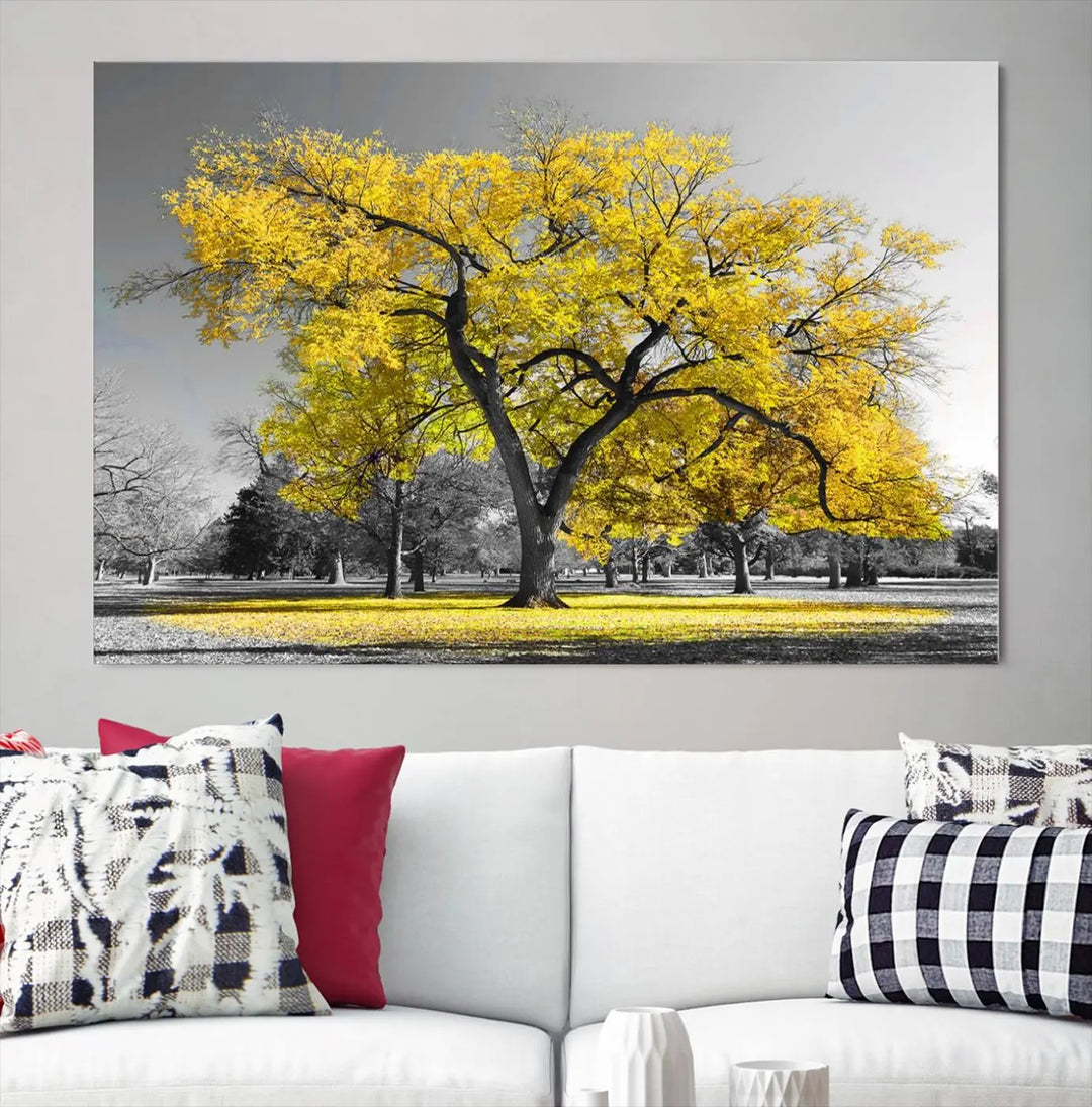 The "Big Yellow Tree Canvas Wall Art Print Black White Yellow Art Painting" showcases a large yellow tree in a park.