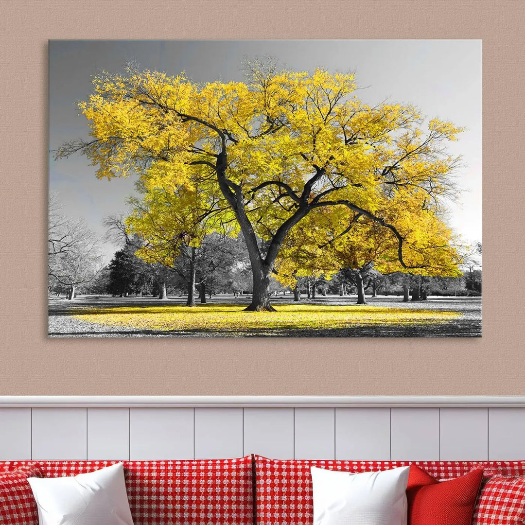 The "Big Yellow Tree Canvas Wall Art Print Black White Yellow Art Painting" showcases a large yellow tree in a park.