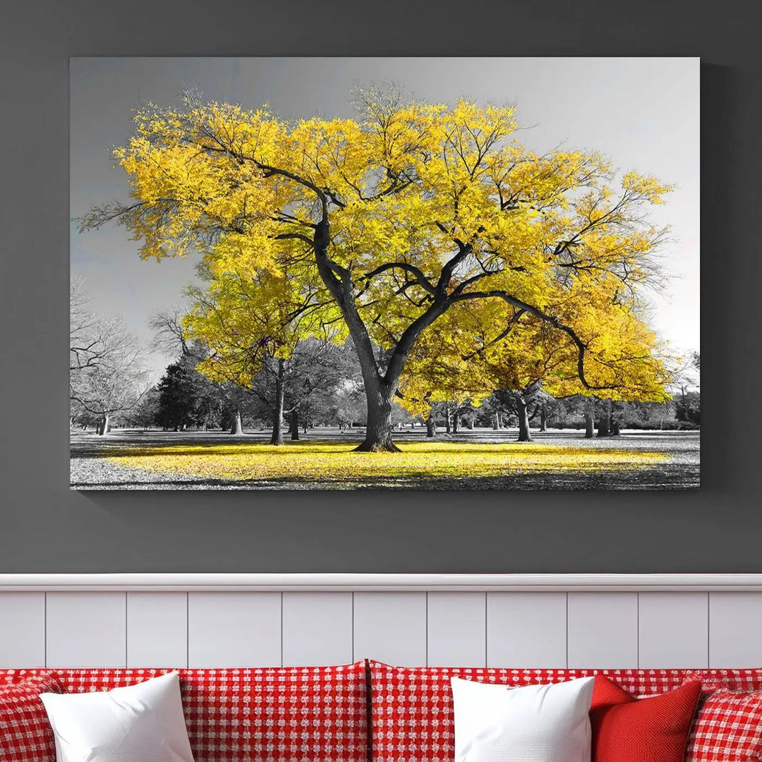 The "Big Yellow Tree Canvas Wall Art Print Black White Yellow Art Painting" showcases a large yellow tree in a park.