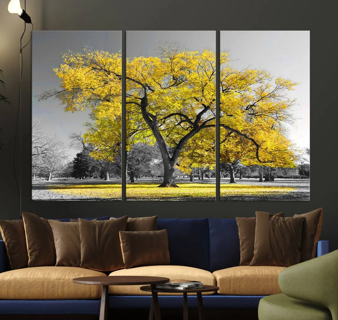 The "Big Yellow Tree Canvas Wall Art Print Black White Yellow Art Painting" showcases a large yellow tree in a park.