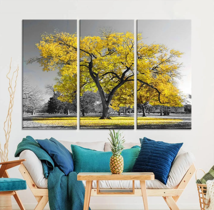 The "Big Yellow Tree Canvas Wall Art Print Black White Yellow Art Painting" showcases a large yellow tree in a park.