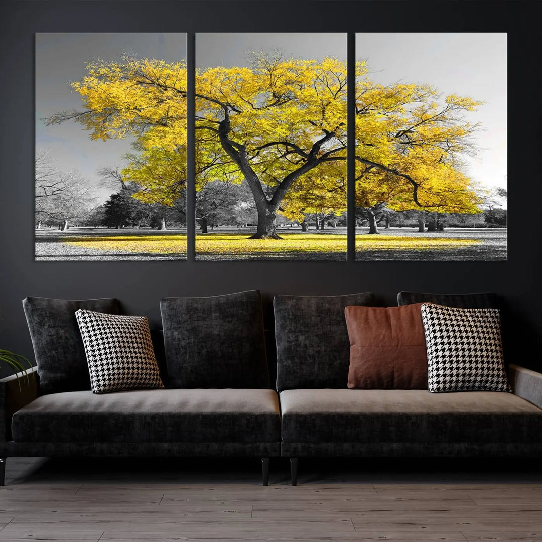 The "Big Yellow Tree Canvas Wall Art Print Black White Yellow Art Painting" showcases a large yellow tree in a park.