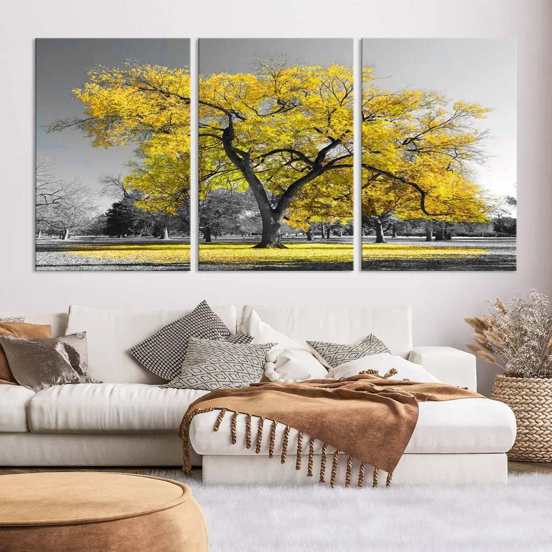 The "Big Yellow Tree Canvas Wall Art Print Black White Yellow Art Painting" showcases a large yellow tree in a park.