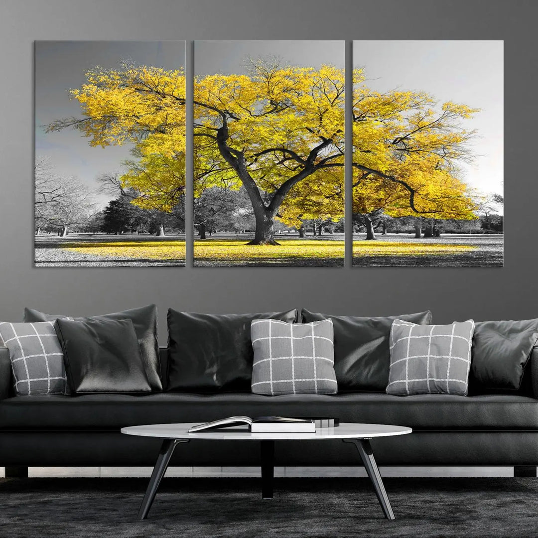 The "Big Yellow Tree Canvas Wall Art Print Black White Yellow Art Painting" showcases a large yellow tree in a park.