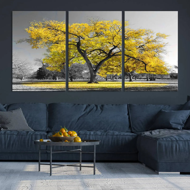 The "Big Yellow Tree Canvas Wall Art Print Black White Yellow Art Painting" showcases a large yellow tree in a park.