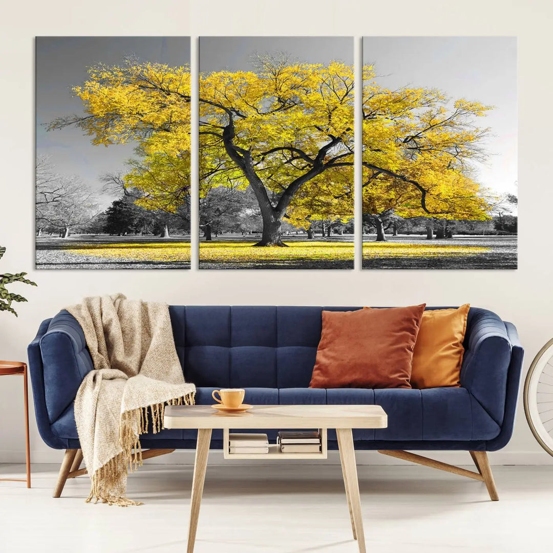 The "Big Yellow Tree Canvas Wall Art Print Black White Yellow Art Painting" showcases a large yellow tree in a park.