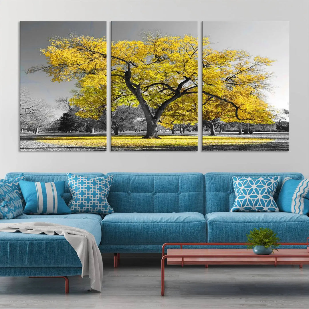 The "Big Yellow Tree Canvas Wall Art Print Black White Yellow Art Painting" showcases a large yellow tree in a park.