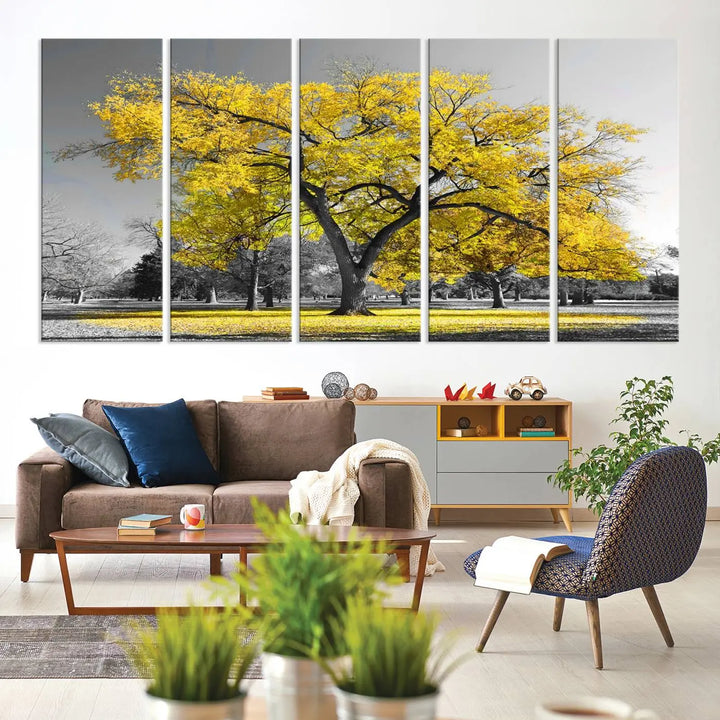 The "Big Yellow Tree Canvas Wall Art Print Black White Yellow Art Painting" showcases a large yellow tree in a park.