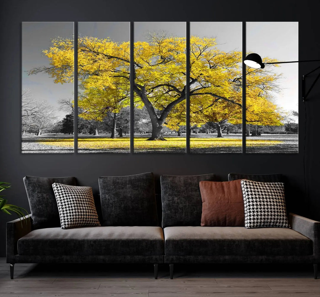 The "Big Yellow Tree Canvas Wall Art Print Black White Yellow Art Painting" showcases a large yellow tree in a park.