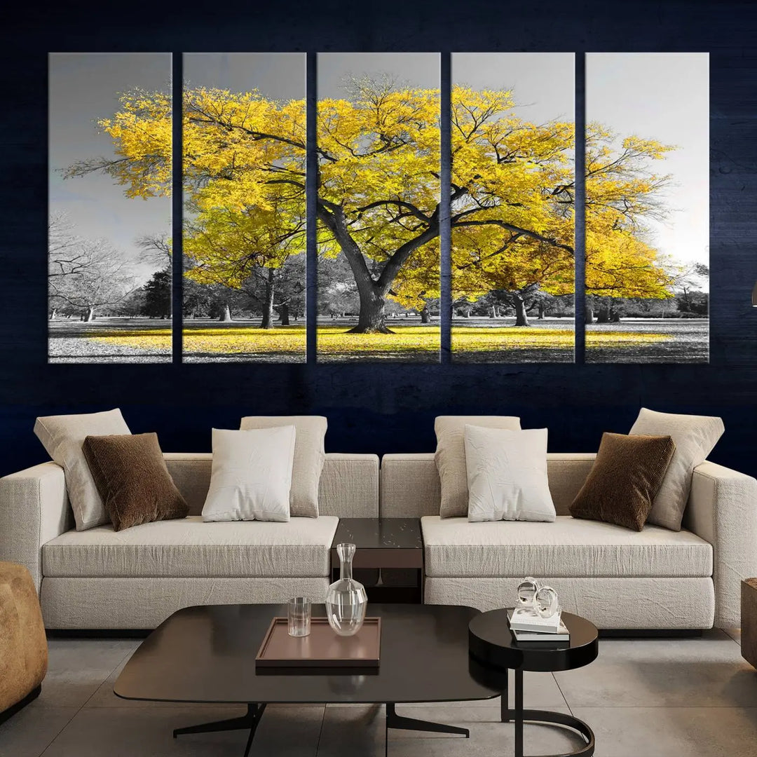 The "Big Yellow Tree Canvas Wall Art Print Black White Yellow Art Painting" showcases a large yellow tree in a park.