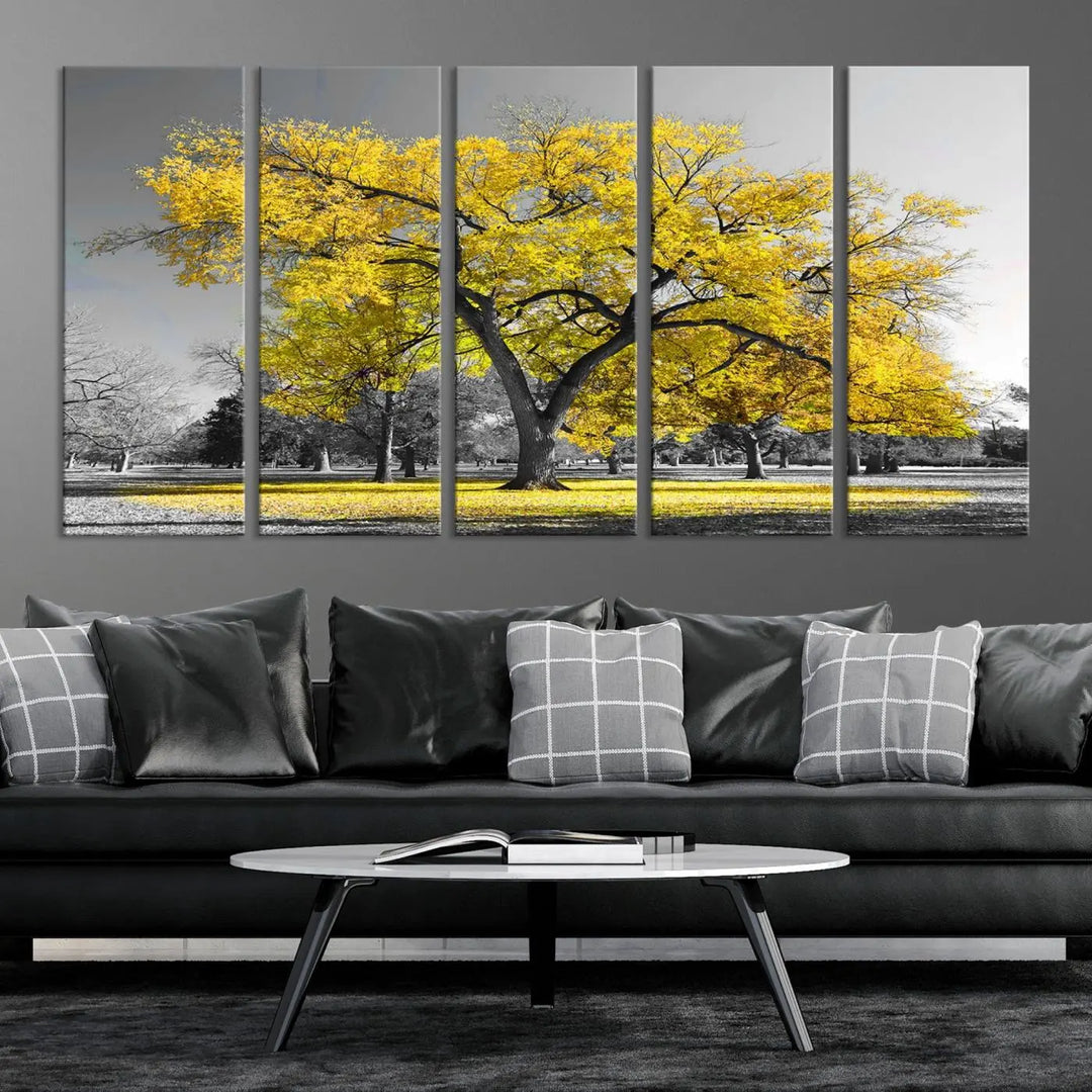 The "Big Yellow Tree Canvas Wall Art Print Black White Yellow Art Painting" showcases a large yellow tree in a park.