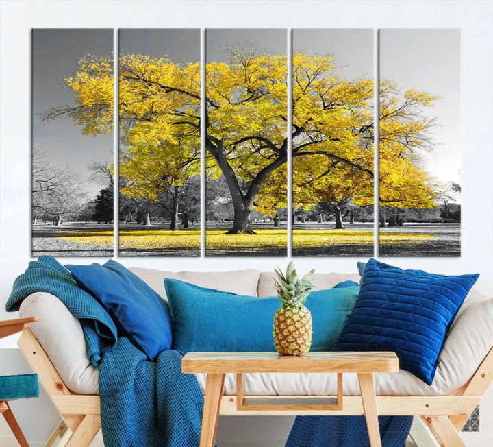 The "Big Yellow Tree Canvas Wall Art Print Black White Yellow Art Painting" showcases a large yellow tree in a park.