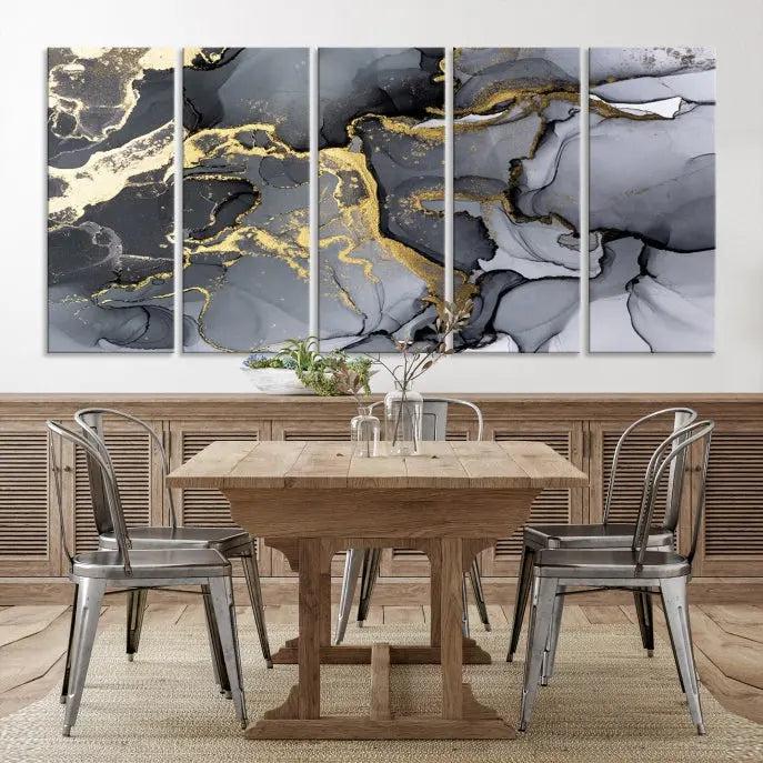 The Black Marble Fluid Effect Wall Art Abstract Canvas Wall Art Print features a triptych of black, gray, and gold abstract designs on museum-quality canvas. This elegant piece is ready to hang and includes a UV-protective coating to ensure its enduring allure.