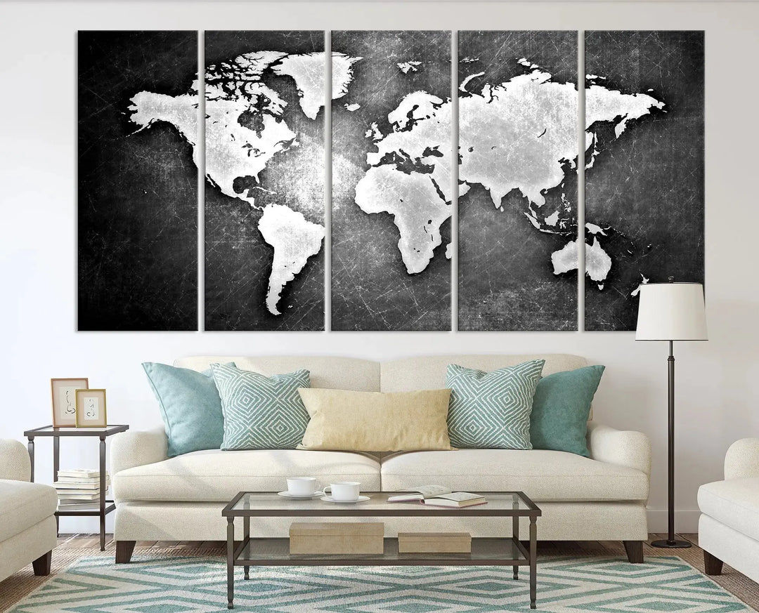 The Black Metallic Wall Art World Map Canvas Print, crafted on museum-quality canvas, adorns a textured wall. The gallery-wrapped artwork features a UV-protective coating that ensures the stunning colors will endure over time.