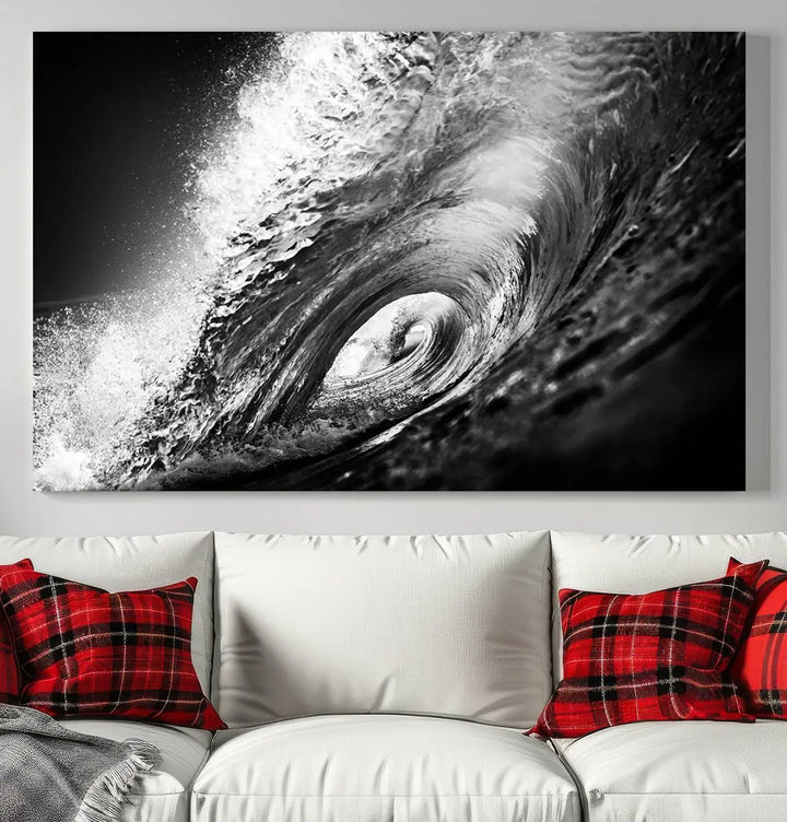 A three-panel display of the "Black Ocean Wave at Sunset Canvas Art" features a vibrant depiction of water waves in black and white, perfectly capturing the coastal ambiance.