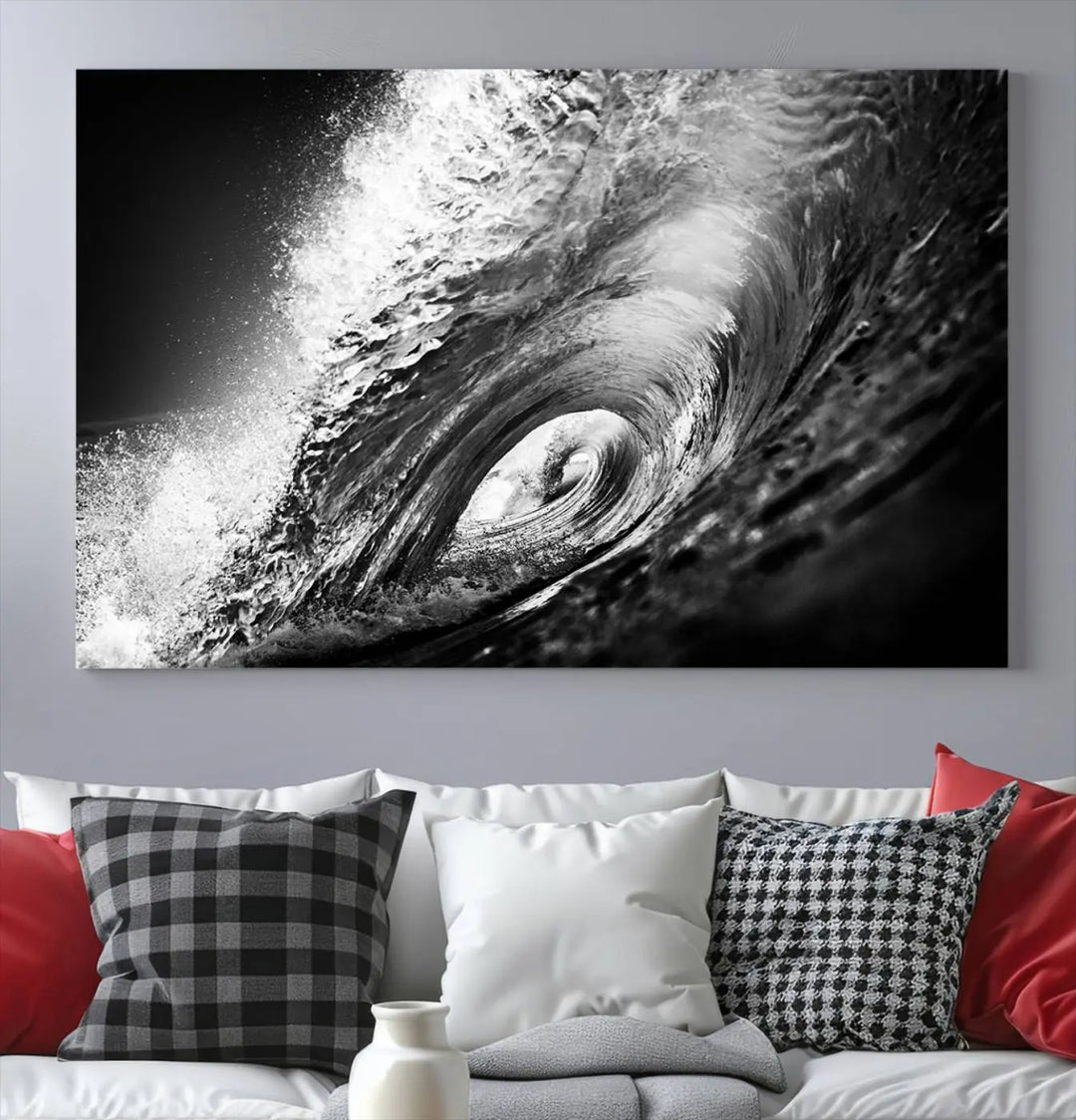 A three-panel display of the "Black Ocean Wave at Sunset Canvas Art" features a vibrant depiction of water waves in black and white, perfectly capturing the coastal ambiance.