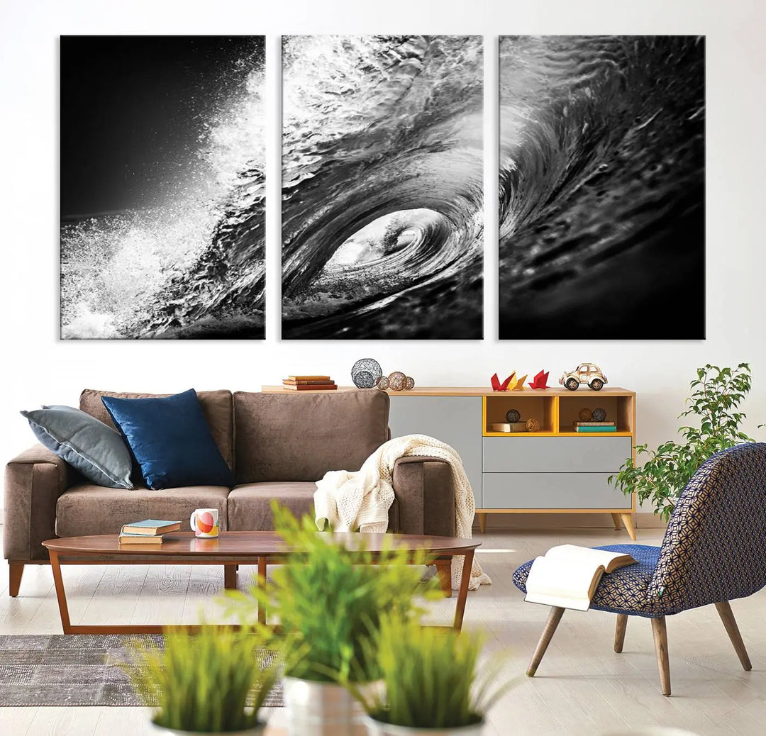 A three-panel display of the "Black Ocean Wave at Sunset Canvas Art" features a vibrant depiction of water waves in black and white, perfectly capturing the coastal ambiance.