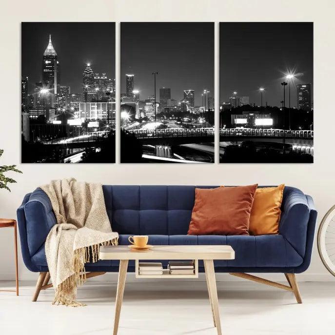 The living room features the striking Black White Atlanta Wall Art Cityscape Canvas Print on the wall. This gallery-wrapped artwork is beautifully displayed on museum-quality canvas, complete with a UV-protective coating to maintain its allure.