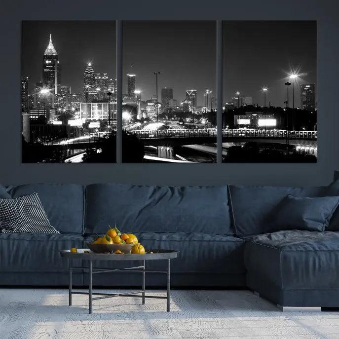 The living room features the striking Black White Atlanta Wall Art Cityscape Canvas Print on the wall. This gallery-wrapped artwork is beautifully displayed on museum-quality canvas, complete with a UV-protective coating to maintain its allure.