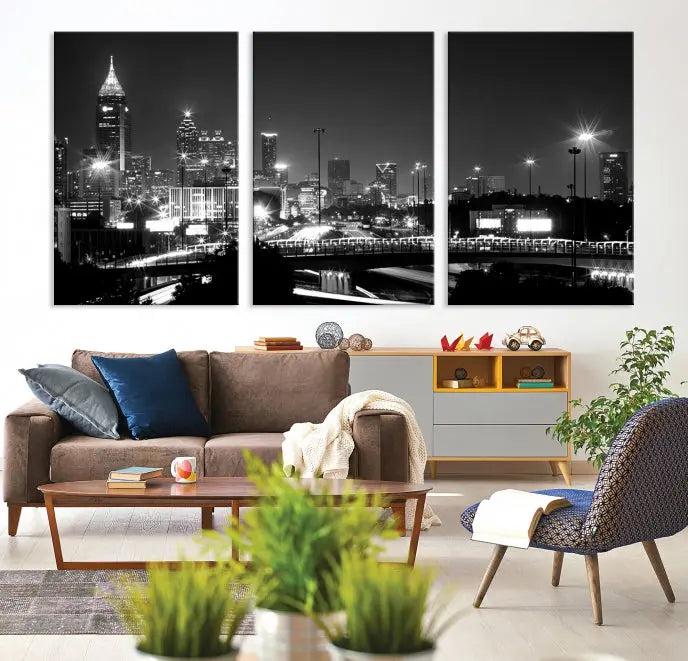 The living room features the striking Black White Atlanta Wall Art Cityscape Canvas Print on the wall. This gallery-wrapped artwork is beautifully displayed on museum-quality canvas, complete with a UV-protective coating to maintain its allure.