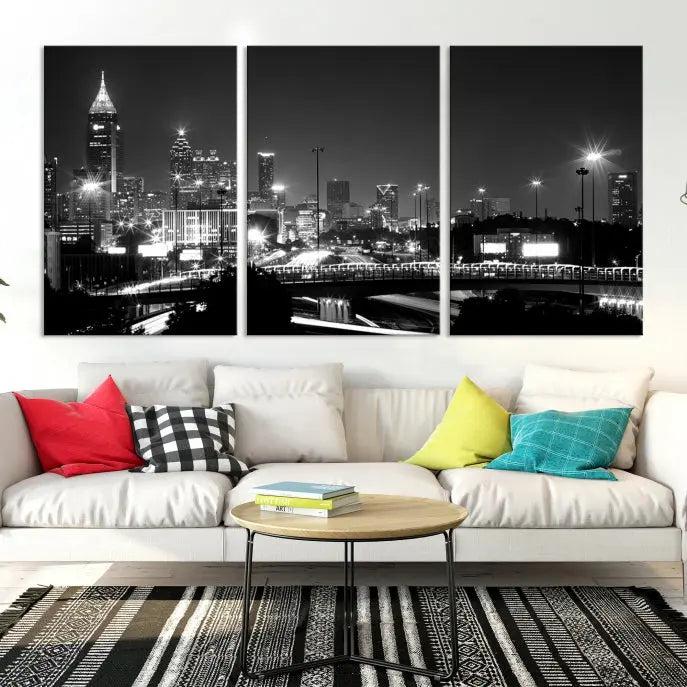 The living room features the striking Black White Atlanta Wall Art Cityscape Canvas Print on the wall. This gallery-wrapped artwork is beautifully displayed on museum-quality canvas, complete with a UV-protective coating to maintain its allure.