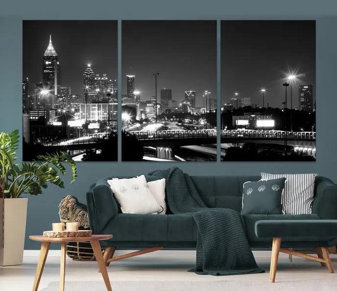 The living room features the striking Black White Atlanta Wall Art Cityscape Canvas Print on the wall. This gallery-wrapped artwork is beautifully displayed on museum-quality canvas, complete with a UV-protective coating to maintain its allure.