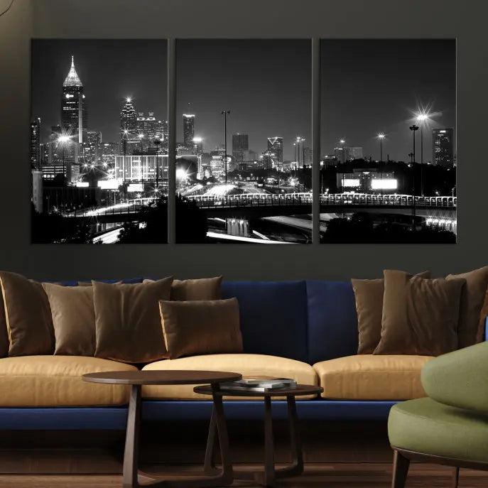 The living room features the striking Black White Atlanta Wall Art Cityscape Canvas Print on the wall. This gallery-wrapped artwork is beautifully displayed on museum-quality canvas, complete with a UV-protective coating to maintain its allure.