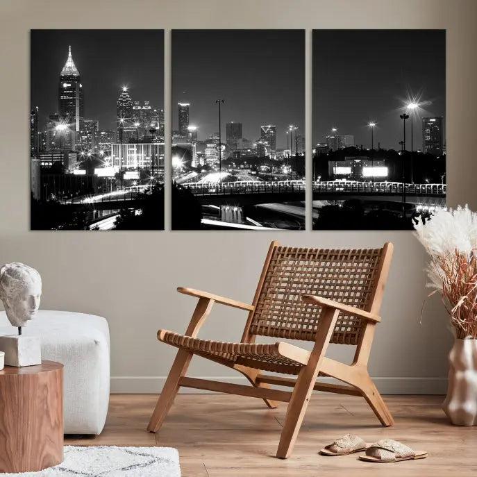 The living room features the striking Black White Atlanta Wall Art Cityscape Canvas Print on the wall. This gallery-wrapped artwork is beautifully displayed on museum-quality canvas, complete with a UV-protective coating to maintain its allure.