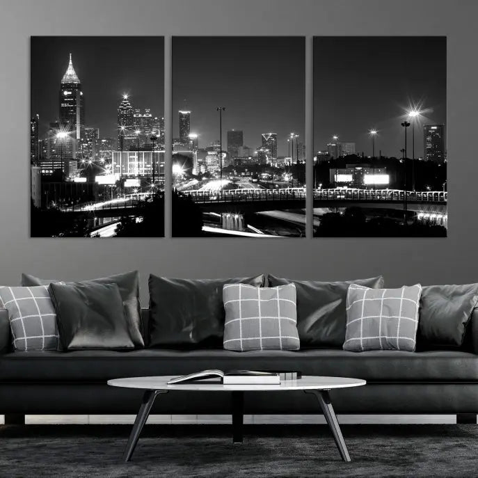 The living room features the striking Black White Atlanta Wall Art Cityscape Canvas Print on the wall. This gallery-wrapped artwork is beautifully displayed on museum-quality canvas, complete with a UV-protective coating to maintain its allure.