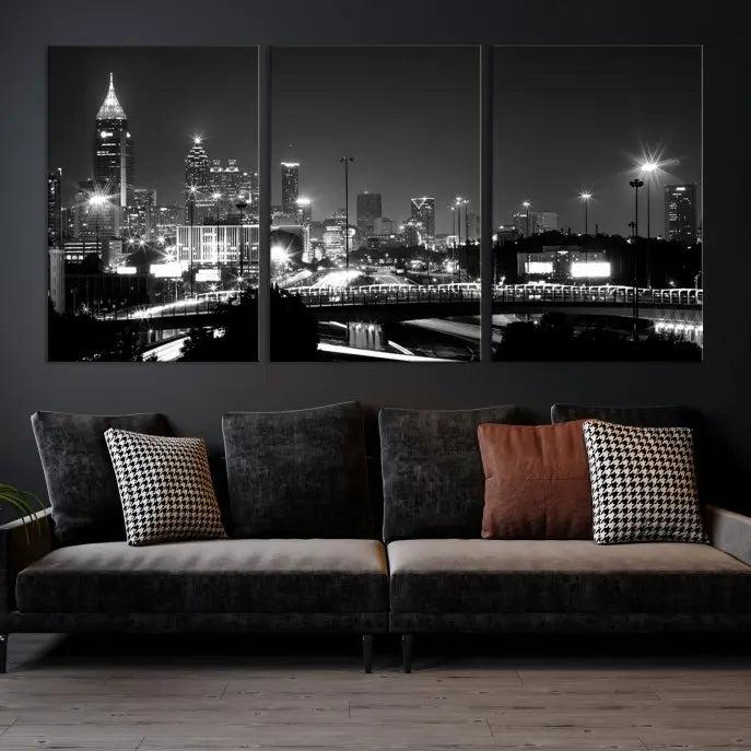 The living room features the striking Black White Atlanta Wall Art Cityscape Canvas Print on the wall. This gallery-wrapped artwork is beautifully displayed on museum-quality canvas, complete with a UV-protective coating to maintain its allure.