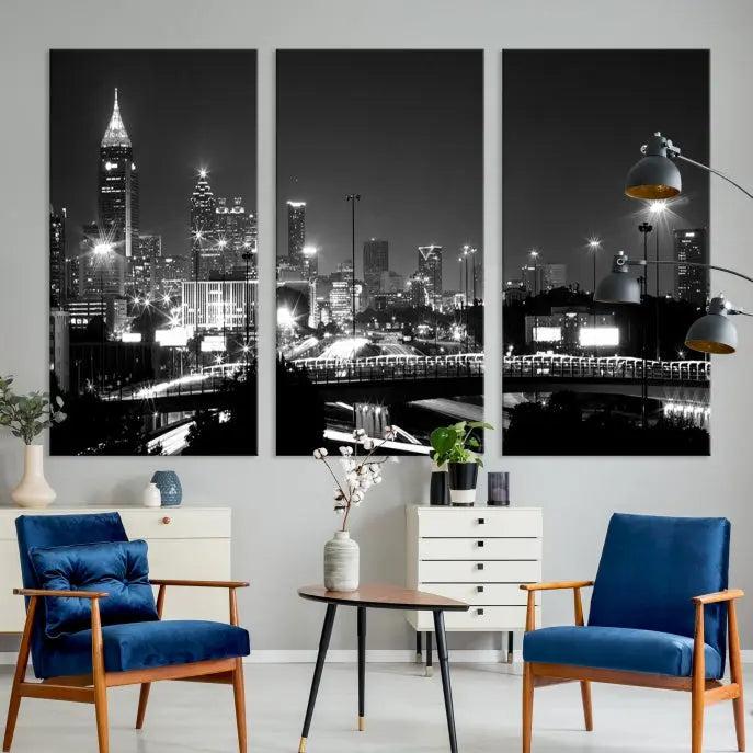 The living room features the striking Black White Atlanta Wall Art Cityscape Canvas Print on the wall. This gallery-wrapped artwork is beautifully displayed on museum-quality canvas, complete with a UV-protective coating to maintain its allure.