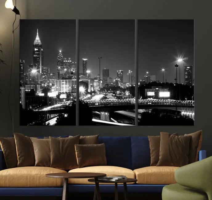 The living room features the striking Black White Atlanta Wall Art Cityscape Canvas Print on the wall. This gallery-wrapped artwork is beautifully displayed on museum-quality canvas, complete with a UV-protective coating to maintain its allure.