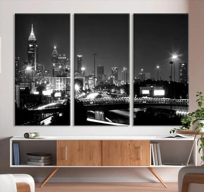 The living room features the striking Black White Atlanta Wall Art Cityscape Canvas Print on the wall. This gallery-wrapped artwork is beautifully displayed on museum-quality canvas, complete with a UV-protective coating to maintain its allure.