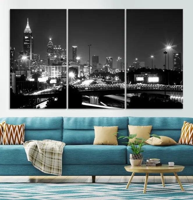 The living room features the striking Black White Atlanta Wall Art Cityscape Canvas Print on the wall. This gallery-wrapped artwork is beautifully displayed on museum-quality canvas, complete with a UV-protective coating to maintain its allure.