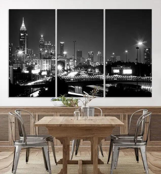 The living room features the striking Black White Atlanta Wall Art Cityscape Canvas Print on the wall. This gallery-wrapped artwork is beautifully displayed on museum-quality canvas, complete with a UV-protective coating to maintain its allure.