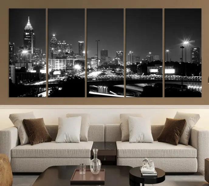 The living room features the striking Black White Atlanta Wall Art Cityscape Canvas Print on the wall. This gallery-wrapped artwork is beautifully displayed on museum-quality canvas, complete with a UV-protective coating to maintain its allure.