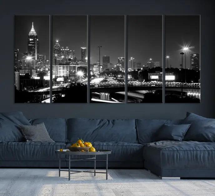 The living room features the striking Black White Atlanta Wall Art Cityscape Canvas Print on the wall. This gallery-wrapped artwork is beautifully displayed on museum-quality canvas, complete with a UV-protective coating to maintain its allure.