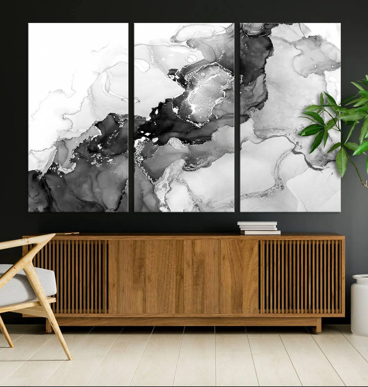 Modern living room showcasing a gallery-wrapped Black White Marble Abstract Wall Art Canvas Print.