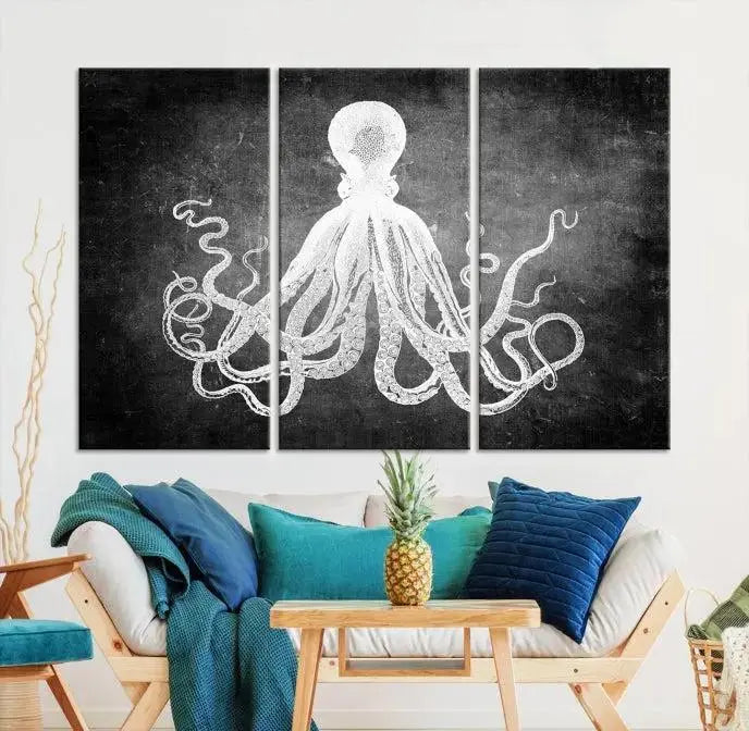 The Black White Octopus Wall Art Canvas Print is a captivating triptych featuring a white octopus against a dark background. Printed on museum-quality canvases, each piece boasts a UV-protective coating to maintain its vibrant elegance in any room.